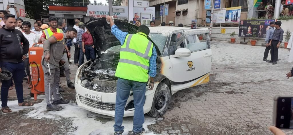 A Swift car suddenly caught fire.